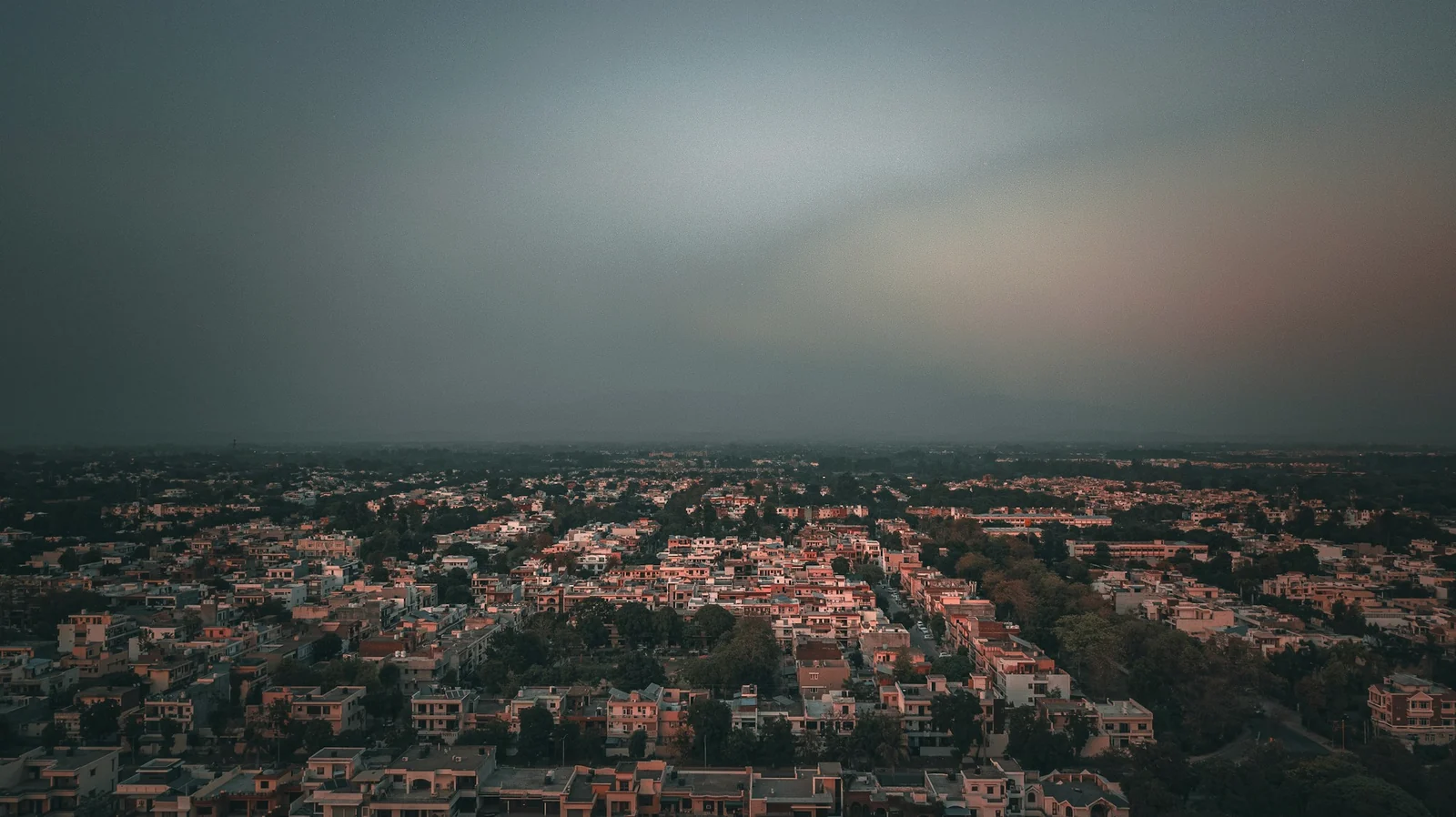 Aerial view across Chandigarh residential districts at dusk